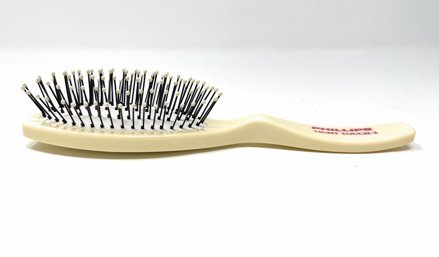 Phillips Brush Light Touch 2 Oval Cushioned Brush Purse Size 7 Rows Bristles Color Ivory